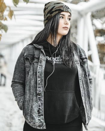 Photo Of Woman Wearing Denim Jacket