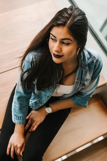 Photo of Woman Wearing Denim Jacket