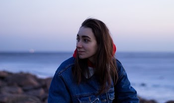 Photo of Woman Wearing Denim Jacket