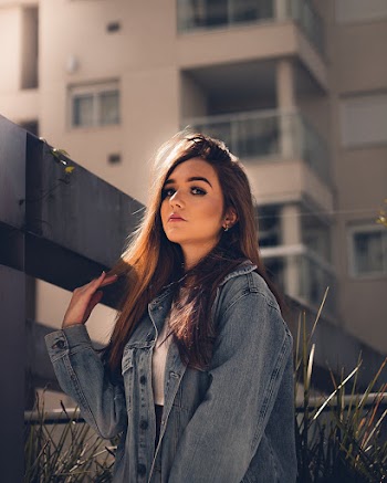 Photo of Woman Wearing Denim Jacket