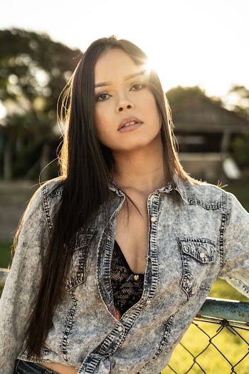 Photo of Woman Wearing Denim Jacket