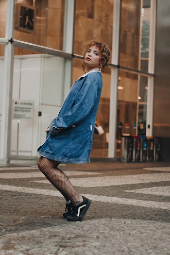 Photo Of Woman Wearing Denim Jacket