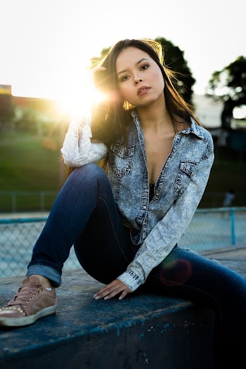 Photo of Woman Wearing Denim Jacket