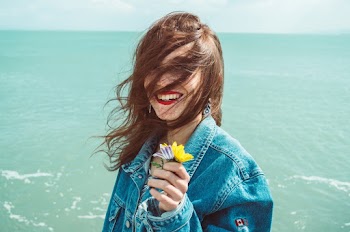 Photo of Woman Wearing Denim Jacket