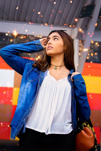 Photo of Woman Wearing Denim Jacket