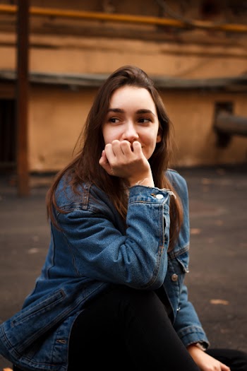 Photo of Woman Wearing Denim Jacket