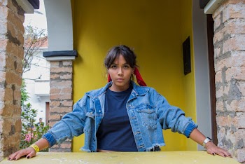 Photo of Woman Wearing Denim Jacket