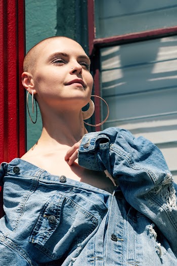 Photo of Woman Wearing Denim Jacket
