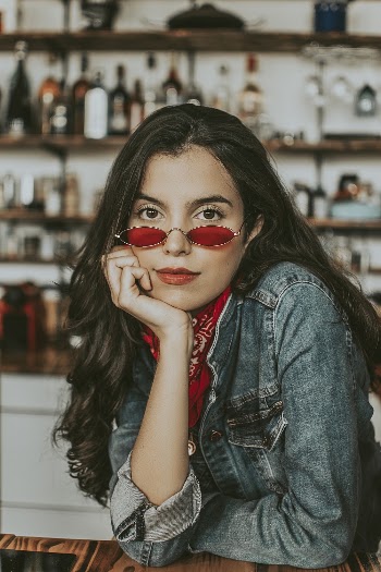 Photo Of Woman Wearing Denim Jacket