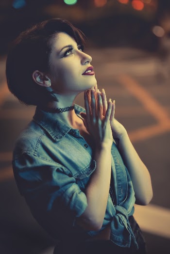 Photo of Woman Wearing Denim Jacket