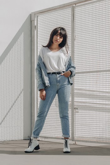 Photo Of Woman Wearing Denim Jacket