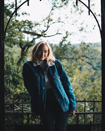 Photo of Woman Wearing Denim Jacket