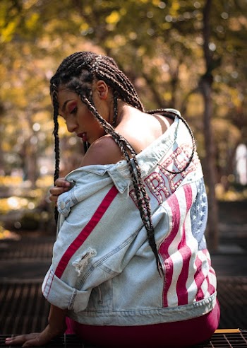 Photo of Woman Wearing Denim Jacket