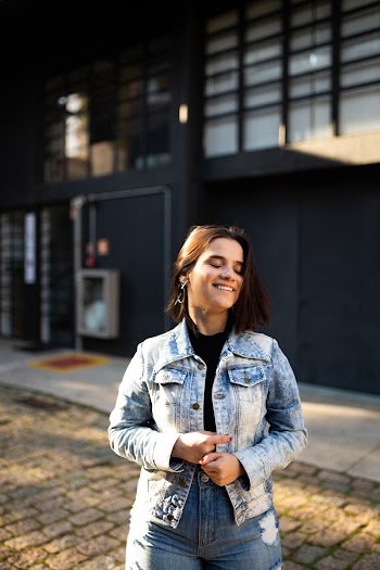 Photo Of Woman Wearing Denim Jacket