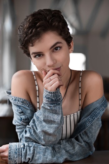 Photo of Woman Wearing Denim Jacket