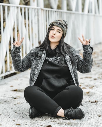 Photo Of Woman Wearing Denim Jacket