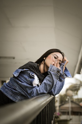 Photo Of Woman Wearing Denim Jacket