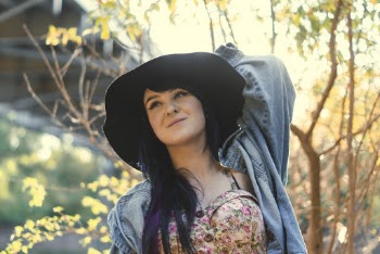 Photo of Woman Wearing Denim Jacket