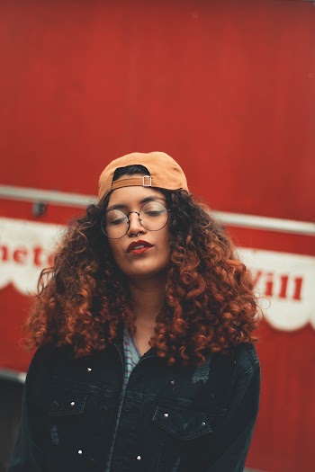 Photo of Woman Wearing Denim Jacket