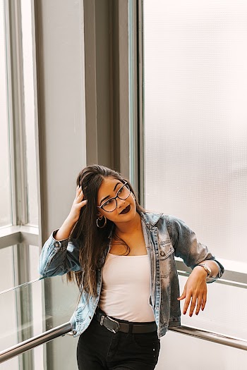 Photo of Woman Wearing Denim Jacket