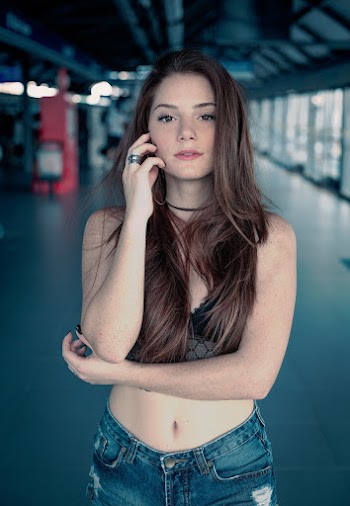 Photo Of Woman Wearing Denim Jeans