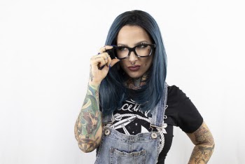 Photo of Woman Wearing Denim Jumpers