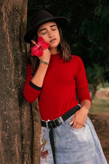Photo Of Woman Wearing Denim Skirt