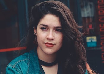Photo Of Woman Wearing Denim Top