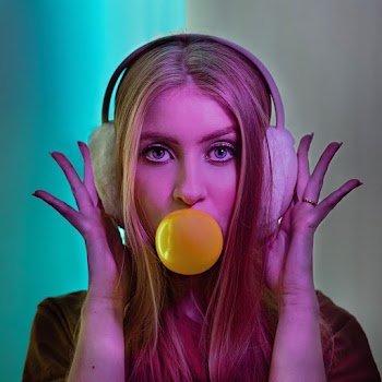 Photo Of Woman Wearing Ear Warmer