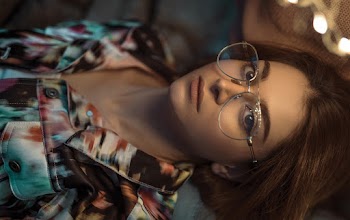 Photo of Woman Wearing Eyeglasses