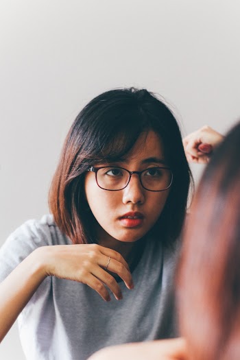 Photo Of Woman Wearing Eyeglasses