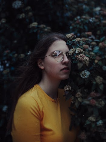 Photo Of Woman Wearing Eyeglasses
