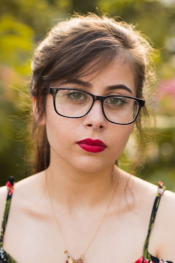 Photo of Woman Wearing Eyeglasses