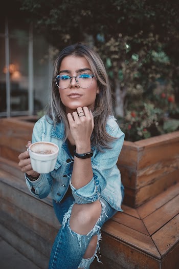 Photo of Woman Wearing Eyeglasses