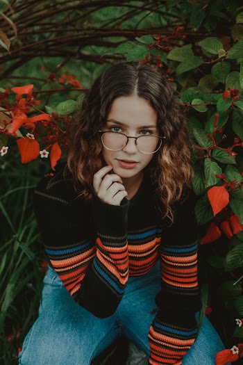 Photo Of Woman Wearing Eyeglasses