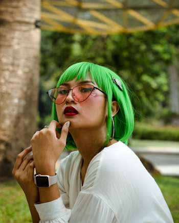 Photo of Woman Wearing Eyeglasses