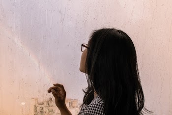 Photo of Woman Wearing Eyeglasses