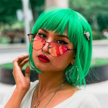 Photo of Woman Wearing Eyeglasses