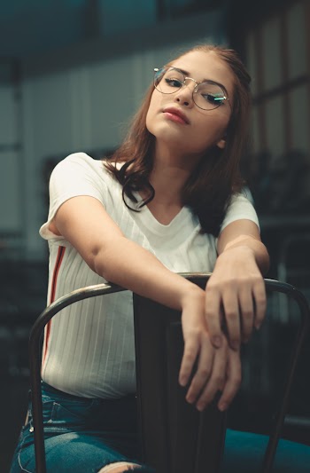 Photo of Woman Wearing Eyeglasses