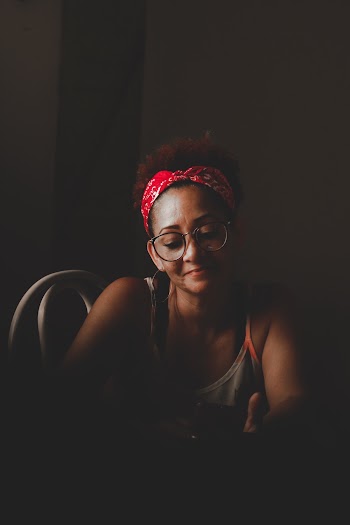 Photo of Woman Wearing Eyeglasses
