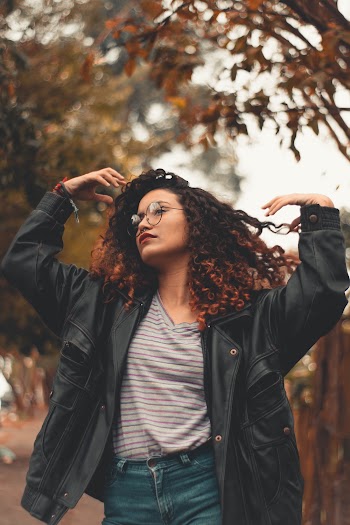 Photo of Woman Wearing Eyeglasses