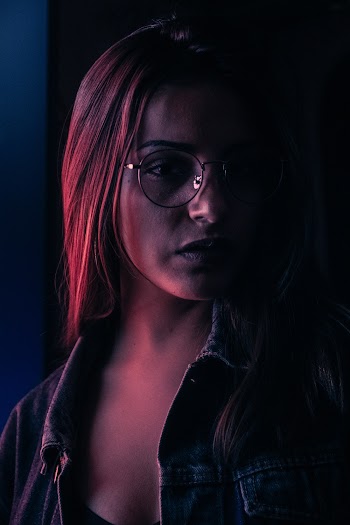 Photo of Woman Wearing Eyeglasses