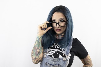 Photo of Woman Wearing Eyeglasses