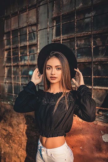 Photo Of Woman Wearing Fedora