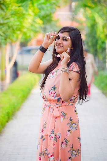 Photo Of Woman Wearing Floral Dress