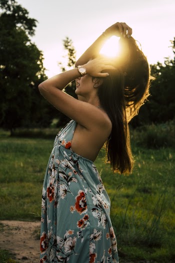 Photo of Woman Wearing Floral Dress