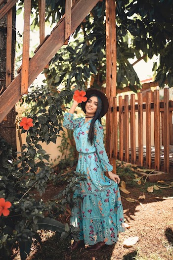 Photo of Woman Wearing Floral Dress