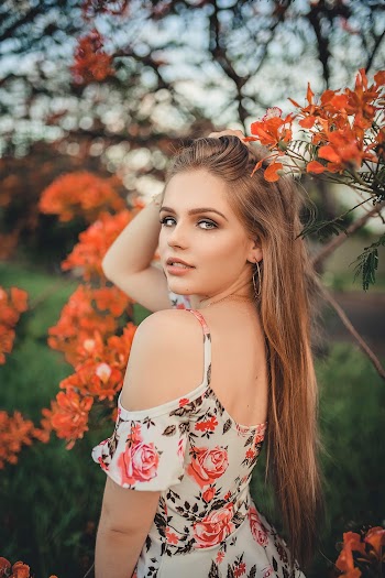Photo Of Woman Wearing Floral Dress