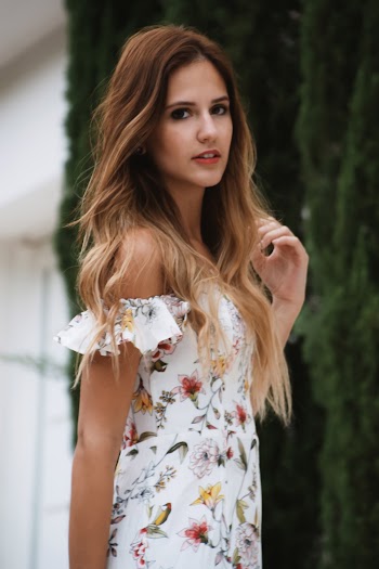 Photo of Woman Wearing Floral Dress