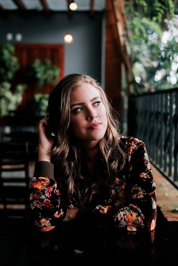 Photo of Woman Wearing Floral Jacket